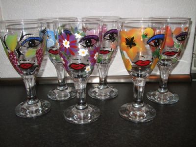 Glas med blomsteransigt